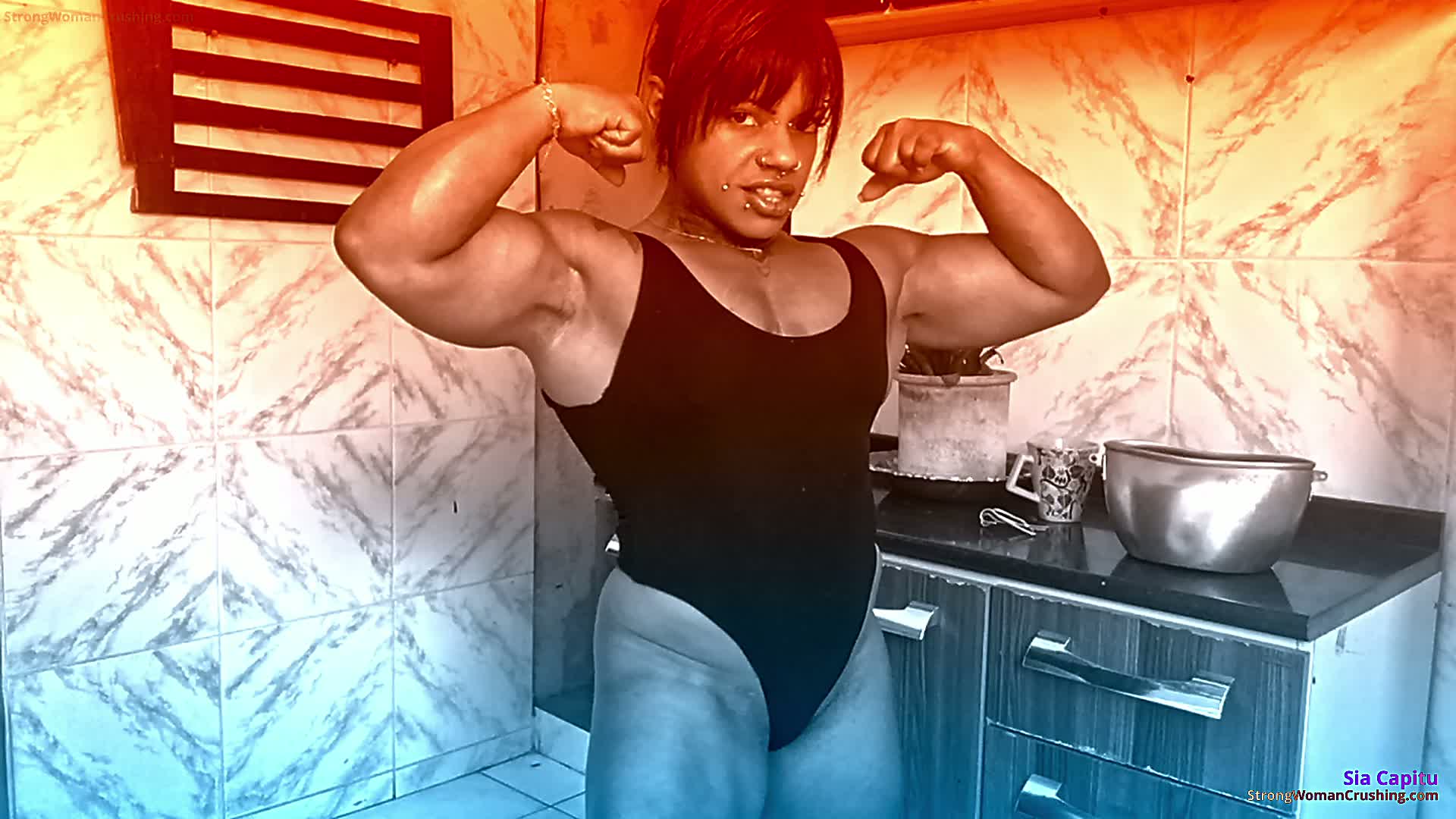 Sia Capitu smashes a metal pan