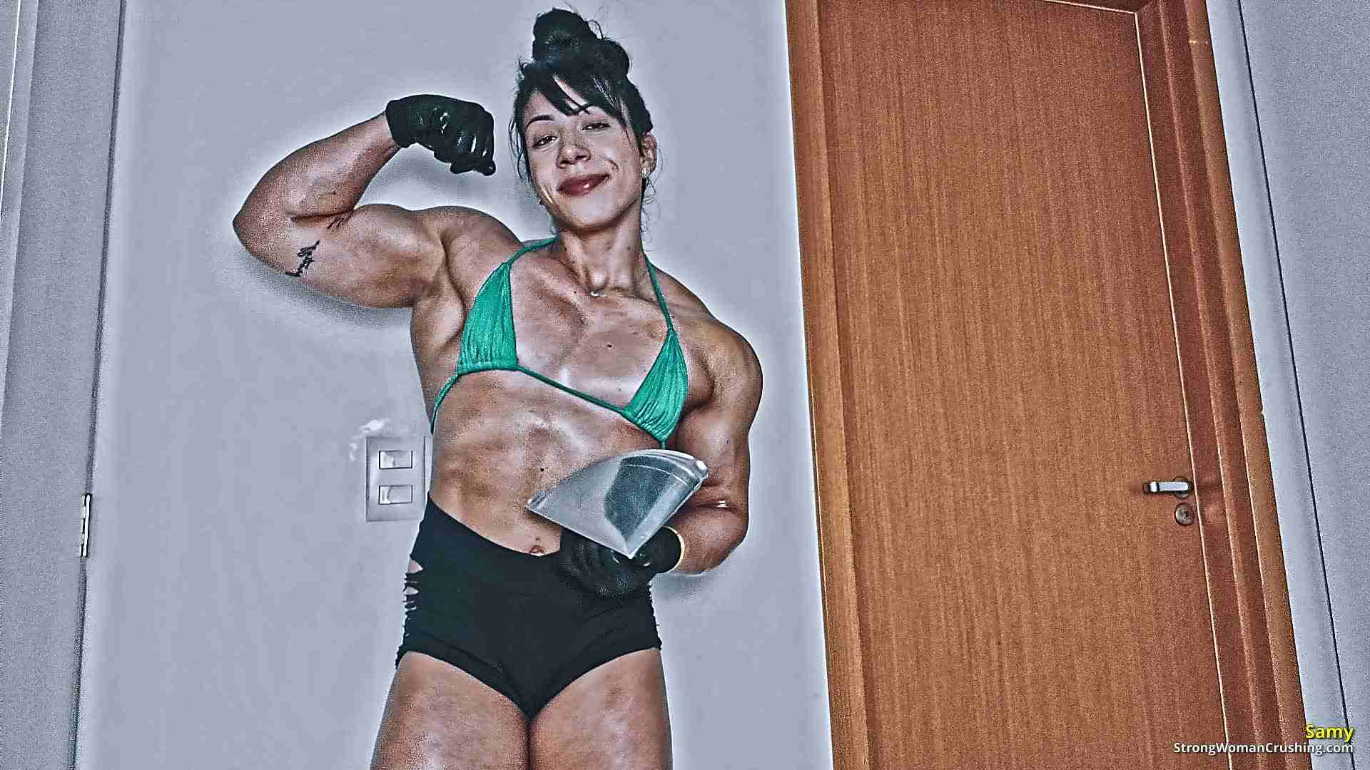 Samy uses her brute strength and bends a metal tray